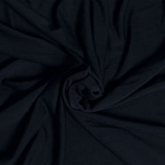 Close-up of dark blue fabric with folds