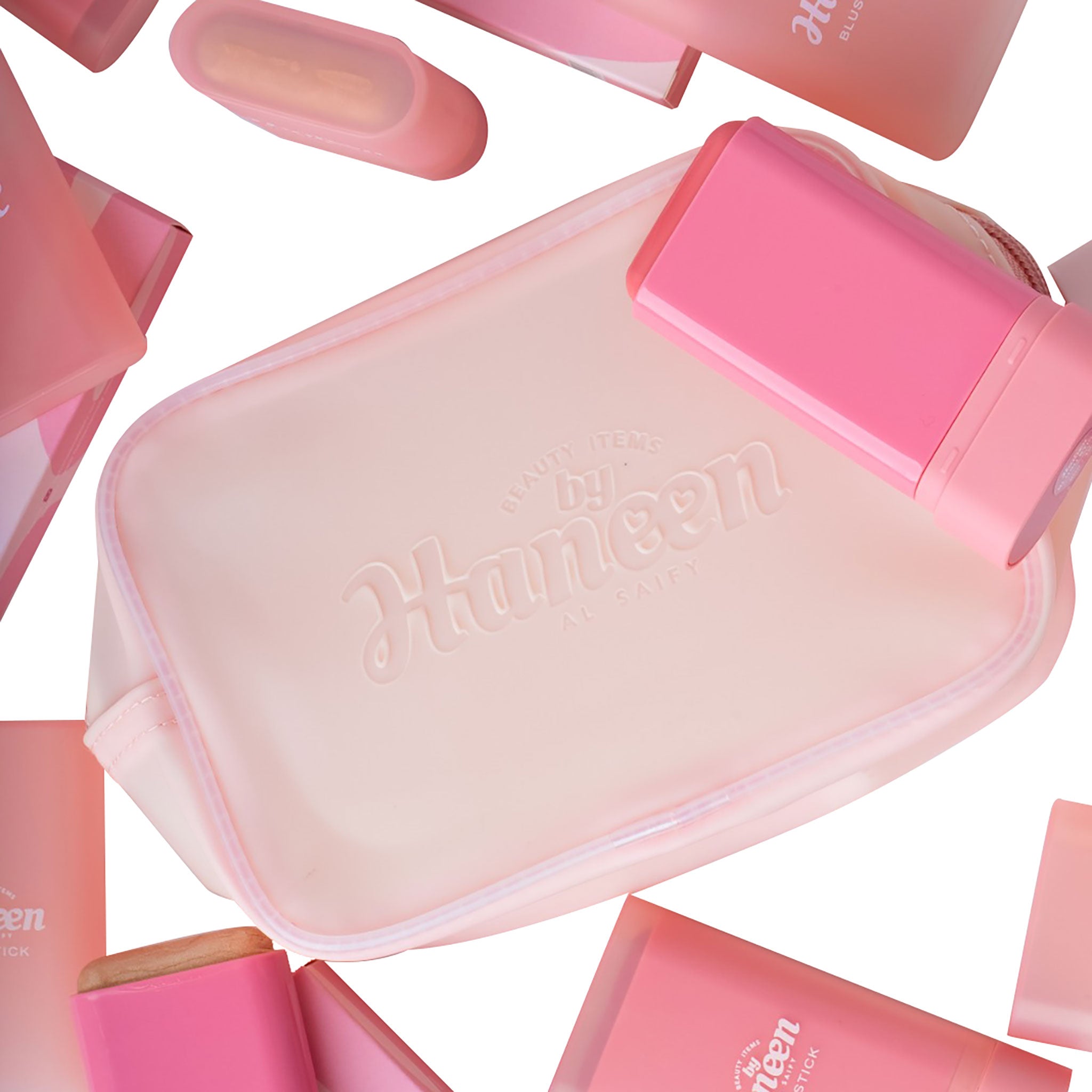 Pink and white cosmetic bag with 'Mistine' branding on a white background